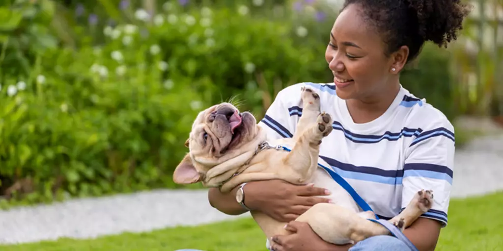 A dog mom with her favorite French Bulldog.